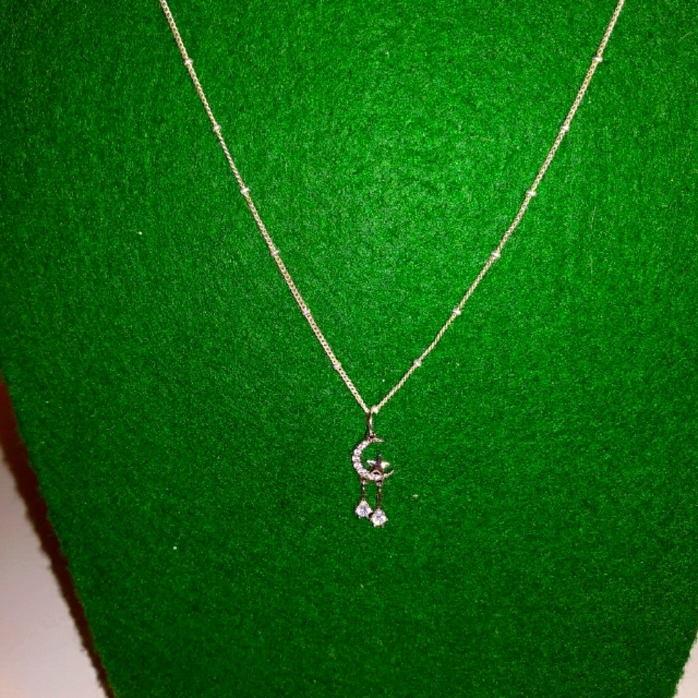 Crescent moon and star necklace